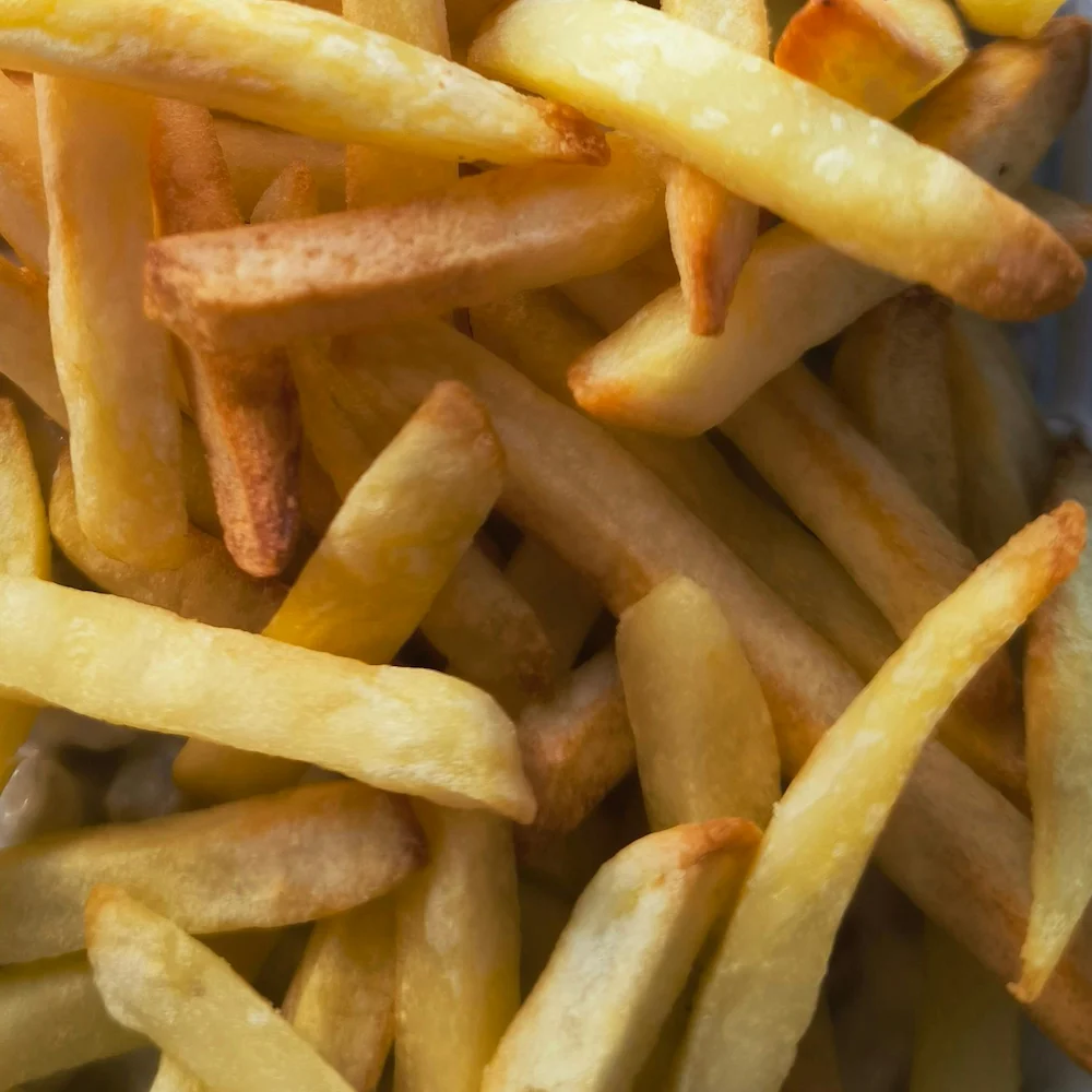 A close up image of french fries.