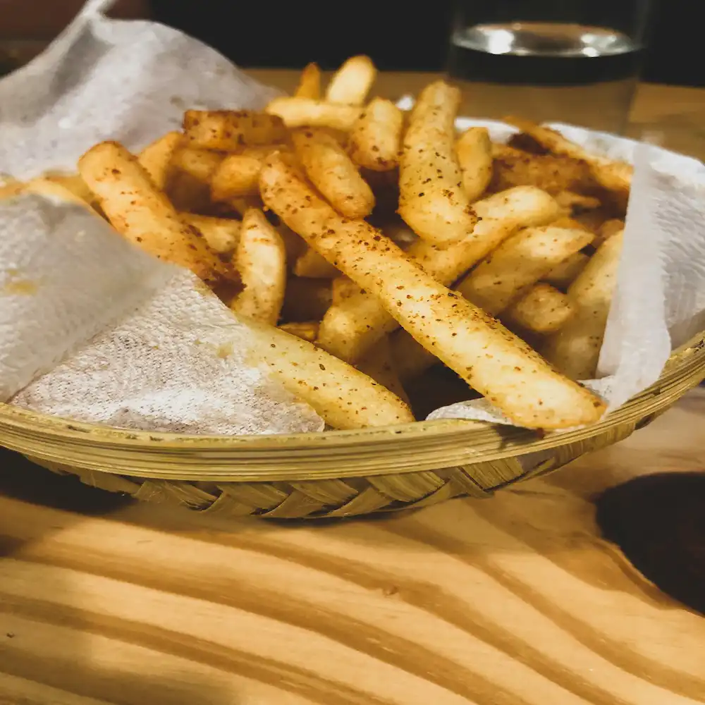 An image of fries that are lightly seasoned.